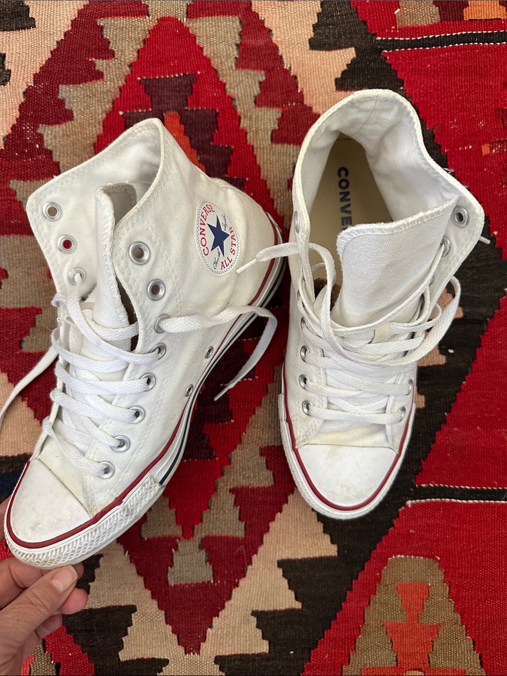 Converse Chuck Taylor White High Top Sneakers with Red Stripe. Old school vibes